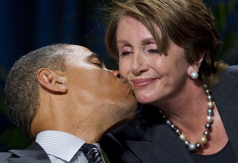 Nancy Pelosi en president Obama. Beeld AFP