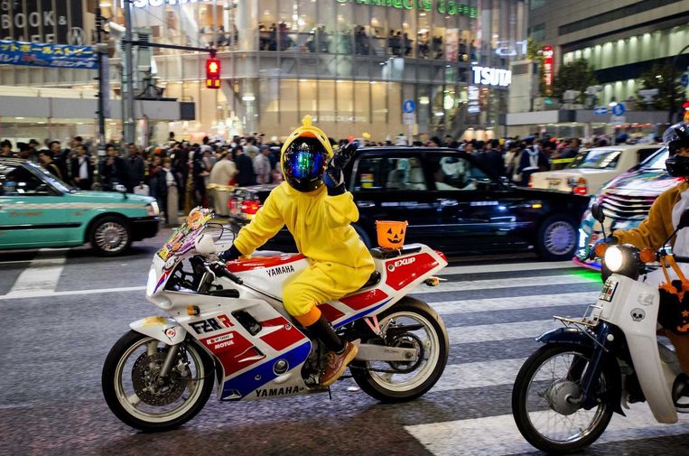 Jongeren in de wijk Shibuya in Tokio. Beeld anp