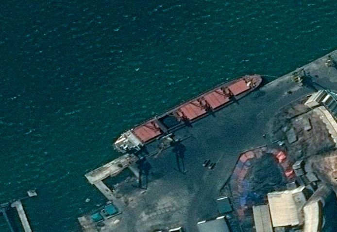 This satellite image provided by the Department of Justice shows what the DoJ says is the North Korean cargo ship Wise Honest docked at a unknown port. The Trump administration has seized the North Korean cargo ship used to supply coal to the isolated nation in violation of international sanctions, law enforcement officials said Thursday, May 9, 2019. The seizure of the vessel, detained last month in Indonesia, comes at a delicate moment between the two countries. (Department of Justice via AP)