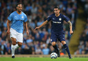 Joleon Lescott en Tim Cahill.