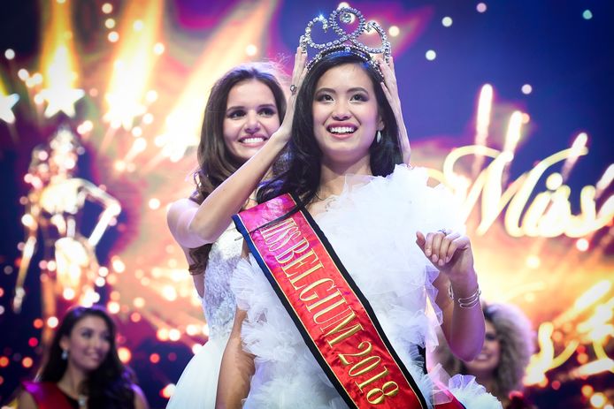 Candidate Angeline Flor Pua celebrates on the podium after winning the Miss Belgium 2018 beauty contest in the Plopsa Theater, Friday 12 January 2018, in De Panne. BELGA PHOTO LAURIE DIEFFEMBACQ