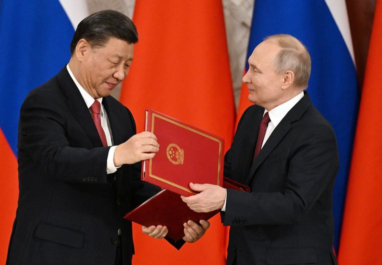 Xi Jinping en Vladimir Poetin in het Kremlin. Beeld Photo News