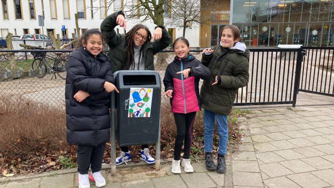 Basisschool de Boog in actie tegen zwerfafval in de wijk: prullenbakken met vrolijke stickers
