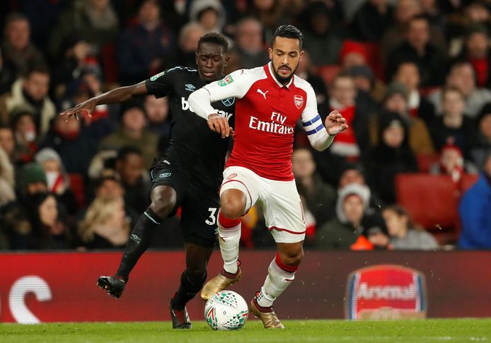 Soccer Football - Carabao Cup Quarter Final - Arsenal vs West Ham United - Emirates Stadium, London, Britain - December 19, 2017   Arsenal's Theo Walcott in action with West Ham United's Domingos Quina                   Action Images via Reuters/Andrew Boyers    EDITORIAL USE ONLY. No use with unauthorized audio, video, data, fixture lists, club/league logos or "live" services. Online in-match use limited to 75 images, no video emulation. No use in betting, games or single club/league/player publications.  Please contact your account representative for further details.