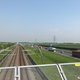 Caspar loopt langs de muur die eigenlijk heel het land in tweeën splitst