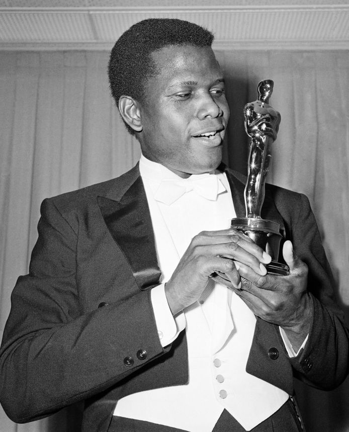 Sidney Poitier in 1964, na z'n winst op de Oscars.