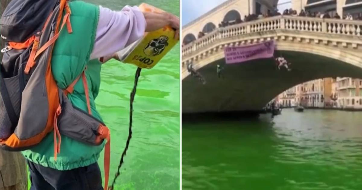 look.  Climate activists turn Venice canal bright green |  outside