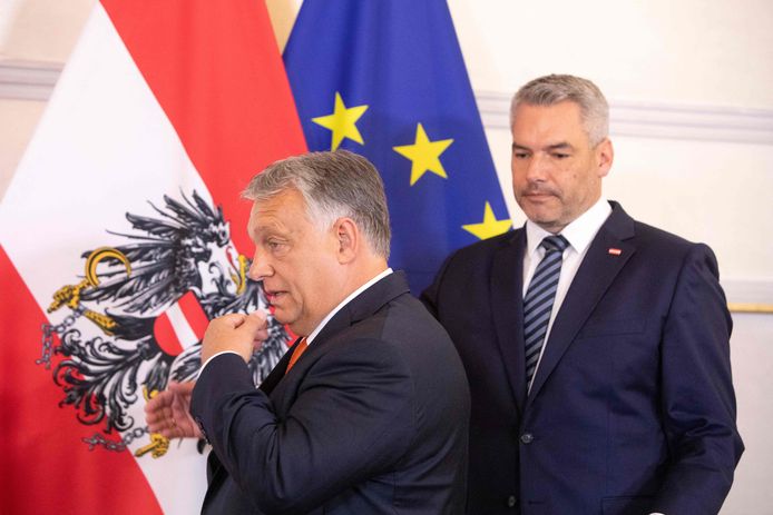Hungarian Prime Minister Victor Orban (L) arrives for a joint press conference with the Austrian Chancellor Karl Nehammer at the Federal Chancellery during Orban's official visit to Austria in Vienna, Austria, July 28, 2022. (Photo by Alex HALADA / AFP)