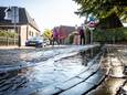 De Stadsbeek in de Westwal. Hier zijn verschillende valpartijen gebeurd doordat het wegdek glad werd als gevolg van het water uit de beek.