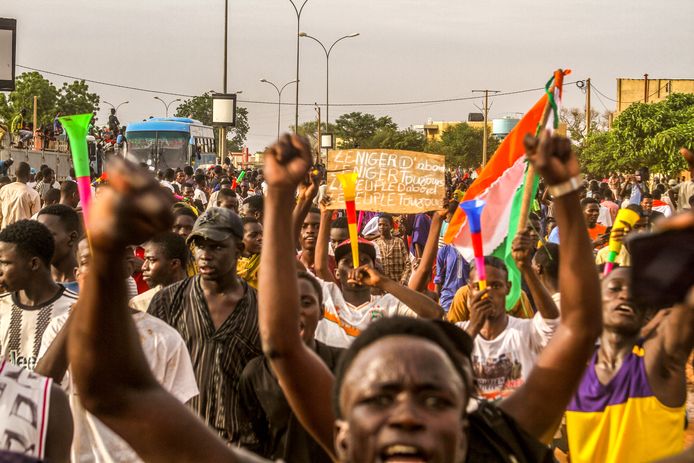 Supporters of the junta demonstrate at a French army base in Niamey, Niger.