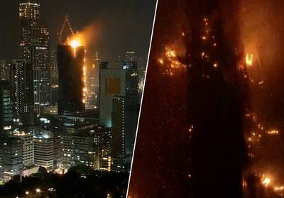 KIJK. Indrukwekkende brand in wolkenkrabber in Hongkong