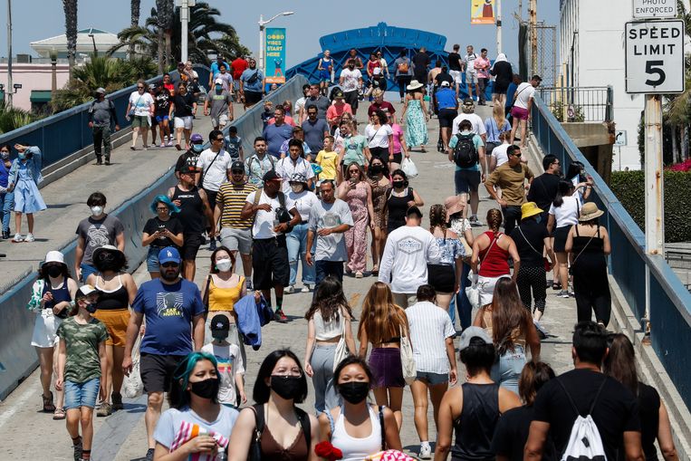 Het aloude Amerikaanse ideaal van ‘the melting pot’ op de Santa Monica Pier in Los Angeles.  Beeld EPA
