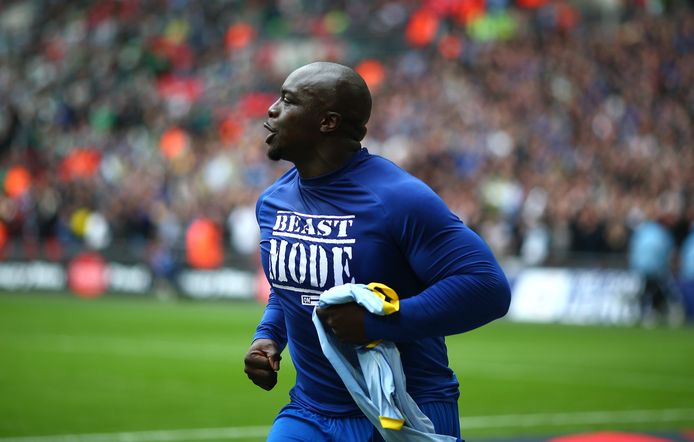 LONDON, ENGLAND - MAY 30: AFC Wimbledon's Adebayo Akinfenwa celebrates after scoring the teams second goal from the penalty spot during the Sky Bet League 2 Play Off Final between Plymouth Argyle and AFC Wimbledon at Wembley Stadium on May 30, 2016 in London, England. (Photo by Charlie Crowhurst/Getty Images)