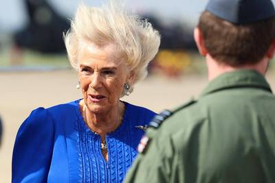 Queen Camilla a bit in the wind during visit to air base