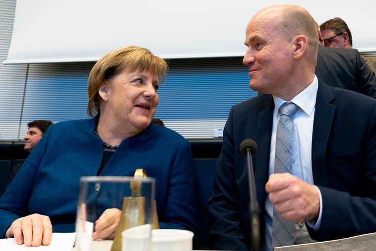 Angela Merkel met Ralph Brinkhaus, fractievoorzitter van de ‘Union’ in de Bondsdag.