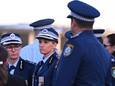 Australische politieagenten tijdens een wake voor de slachtoffers van een dodelijke steekpartij in Sydney vorige maand. Archiefbeeld.