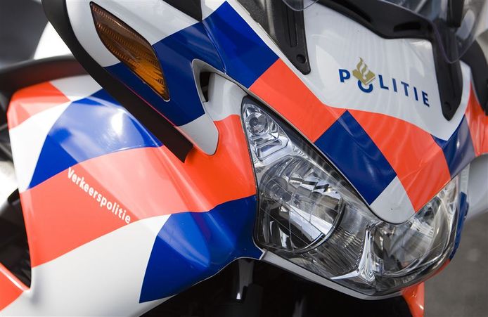 Foto ter illustratie van een motor van de politie.