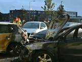 Auto botst op parkeerplaats en vliegt in brand in Nijmegen