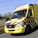 Manager Ambulance Amsterdam reed aangeschoten in dienstauto
