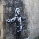 Hoe een schildering van Banksy dit staalstadje in Wales op z'n kop zet