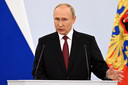 De Russische president Vladimir Poetin tijdens de ondertekeningsceremonie.