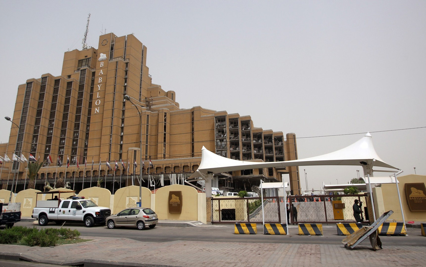 Les attaques d'hôtels de luxe de Bagdad ont fait neuf morts Foto