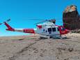 Een helikopter van de hulpdiensten bij Roque Nublo, een van de hoogste punten op Gran Canaria.