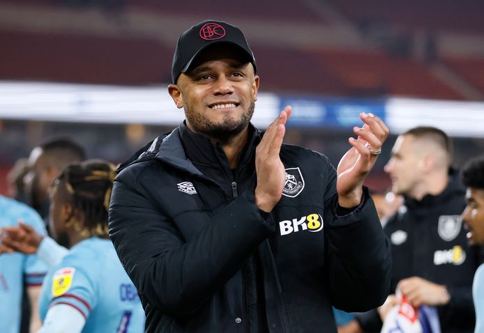 Vincent Kompany celebrates being promoted to Burnley.