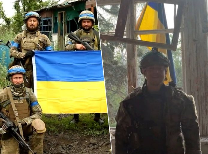 Soldaten hijsen de Oekraïense vlag in de bevrijde dorpen.