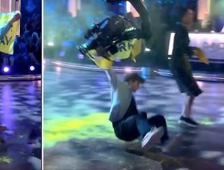 KIJK. Cameraman smakt activist omver wanneer die finale van Zweedse dansshow wil verstoren