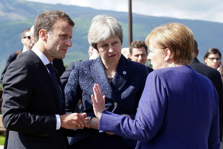 Macron, May en Merkel bij een EU-top in mei. Beeld AFP