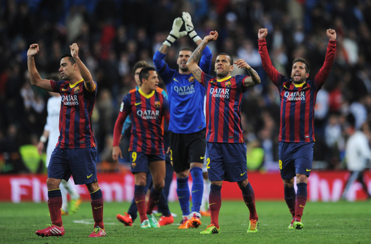 Barcelona-spelers vieren de overwinning op Real Madrid Beeld getty