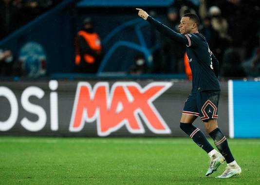 PSG's Kylian Mbappe celebrates after scoring his side's opening goal during the Champions League, round of 16, first leg soccer match between Paris Saint Germain and Real Madrid at the Parc des Princes stadium, in Paris, France, Tuesday, Feb. 15, 2022. (AP Photo/Thibault Camus)