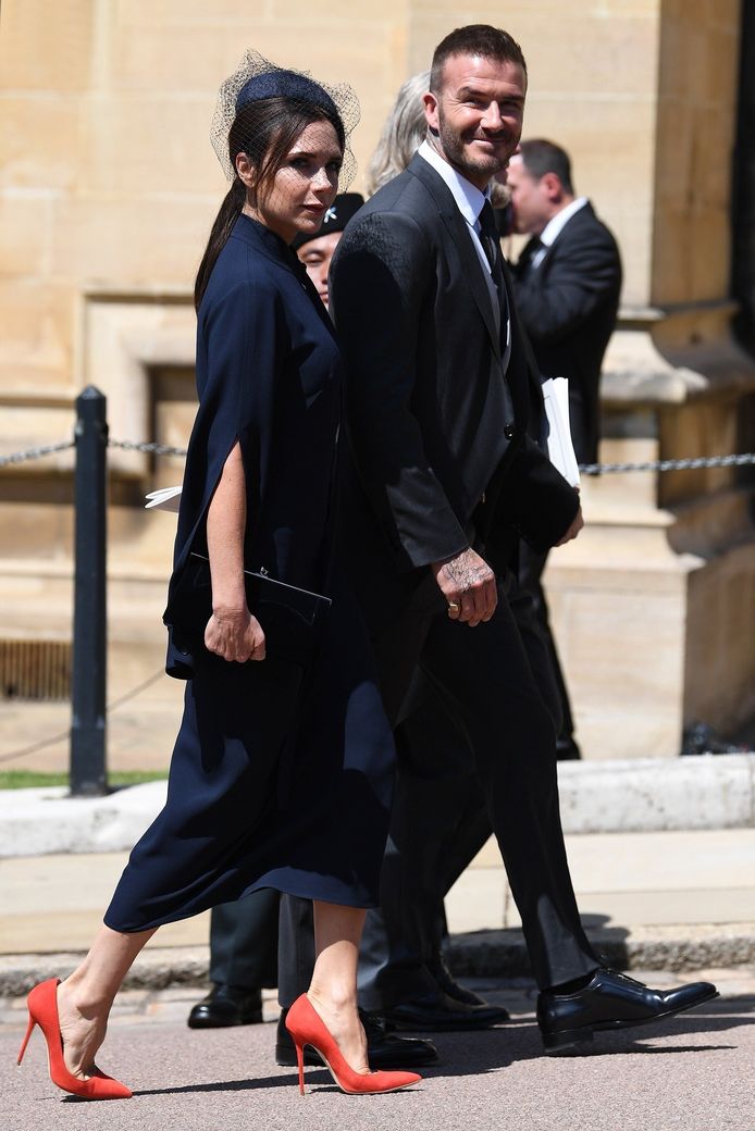 Victoria Beckham en haar man David Beckham tijdens het koninklijke huwelijk op 19 mei.
