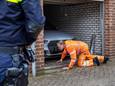 Politie vindt dure Audi bij het openbreken van garageboxen in Overvecht op zoek naar plofkraakspullen.