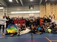 De spelers en fans van ZVC na de overwinning op Texel.