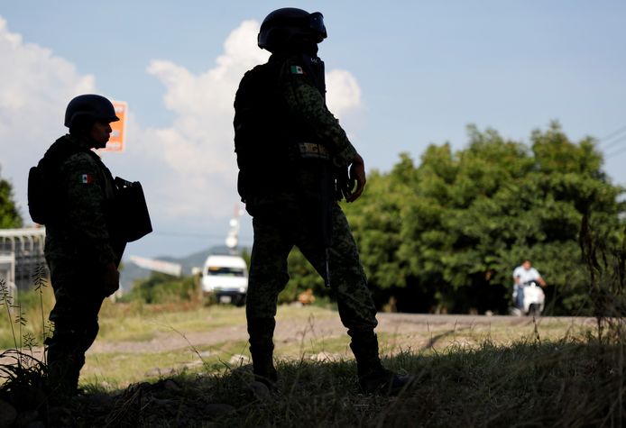 Soldaten patrouilleren nadat agenten in een hinderlaag van een drugskartel terechtkwamen in El Aguaje vorige maand.