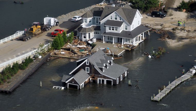 Beschadigde huizen aan de kust van New Jersey, Beeld REUTERS