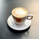 De Volkskrant Cappuccino-index: hoe een Italiaanse kop koffie de staat van Nederland aangeeft