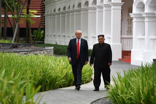 U.S. President Donald Trump and North Korean leader Kim Jong Un walk in the Capella Hotel after their working lunch, on Sentosa island in Singapore June 12, 2018. Anthony Wallace/Pool via Reuters