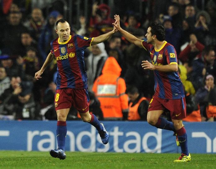 Iniesta en Xavi, de twee legendarische middenvelders van FC Barcelona en de Spaanse nationale ploeg.