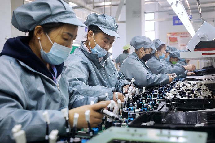 Illustratiefoto: Werknemers van een fabriek in Huaibei in de Chinese provincie Anhui.