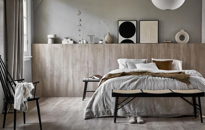 Een slaapkamer die is ingericht door stylist Kim van Rossenberg.