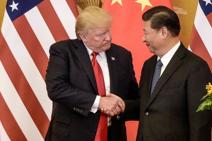 Na een week van harde woorden en wederzijdse verwijten, zijn de Verenigde Staten en China in alle stilte gestart met handelsoverleg. Op de foto de presidenten van beide landen tijdens een bezoek in China in november vorig jaar.