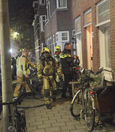 Woningen in Bezuidenhout ontruimd door brand, politie onderzoekt brandstichting