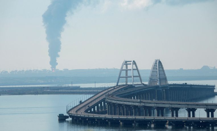 Large plumes of smoke rise near the Crimean Bridge, Wednesday morning, after a drone attack on an oil depot in Volna, Russia.  Reuters photo