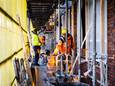 Bouwvakkers aan het werk bij een nieuwbouwproject, foto ter illustratie.