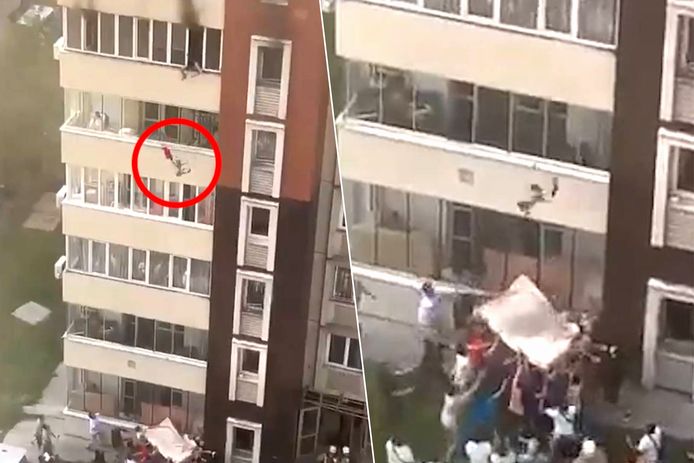 Een vrouw gooit een kind uit het raam om aan een brand in Almaty te ontsnappen.