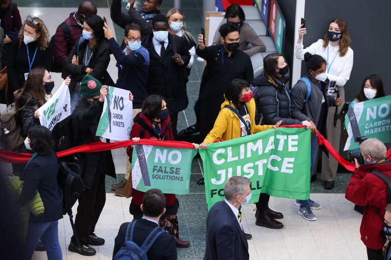 Demonstranten tijdens de klimaattop in Glasgow. Beeld REUTERS