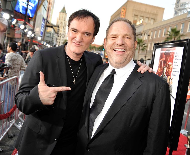 Regisseur Quentin Tarantino en Harvey Weinstein. Beeld AFP